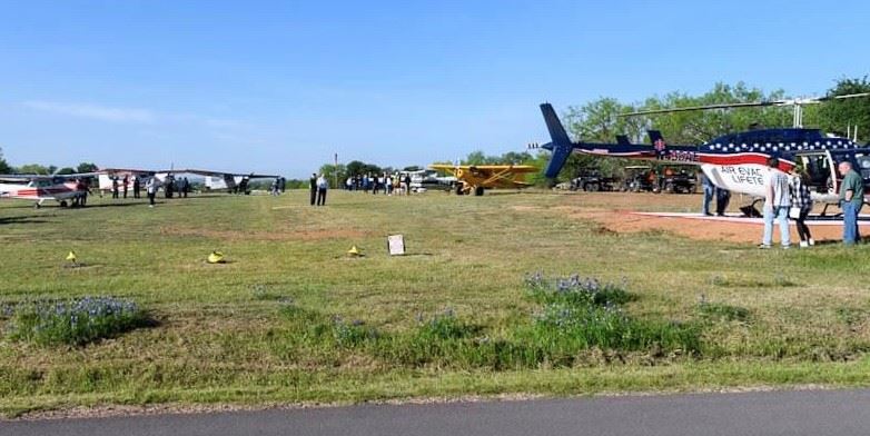 Helicopter and Plans on Airport